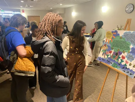 MLK Scholars and Park Scholars viewing each others posters 