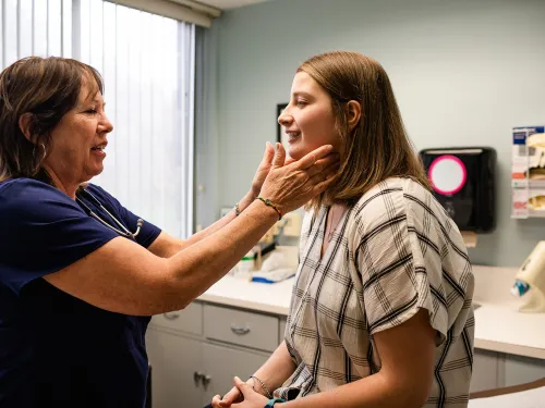 Image of student being evaluated at Hammond Health Center