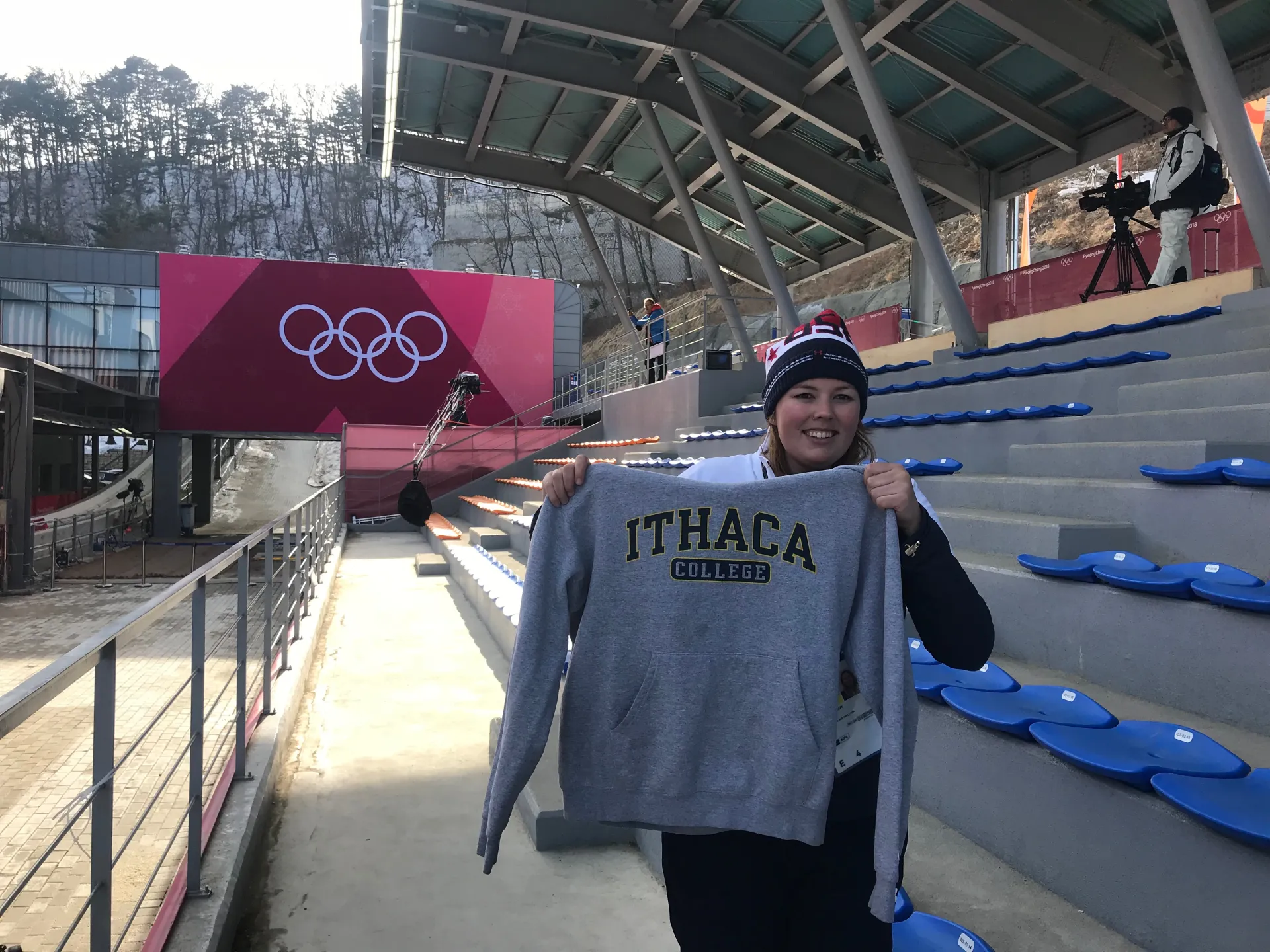 Kristen Gowdy shows her nba买球正规官方网站 sweatshirt at the PyeongChang Olympics.